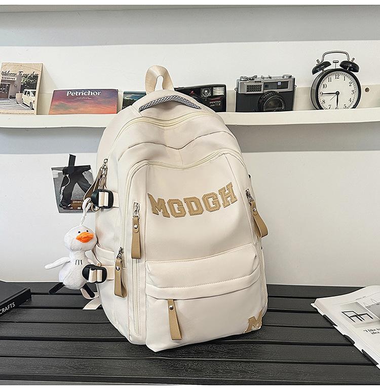 School bag, large capacity, multi-layer, junior high school boys and girls, backpack, burden reduction, spine protection, lightweight