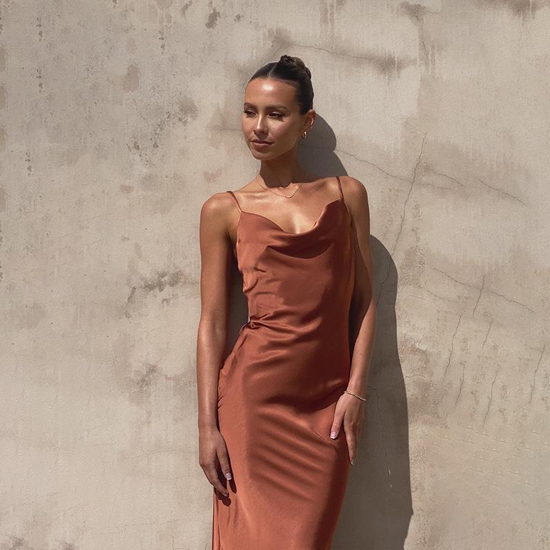 Women's Urban Fashion Solid Color Dress with Deep V-neck, Slim Fit, and Spaghetti Straps for Spring/Summer 2024.