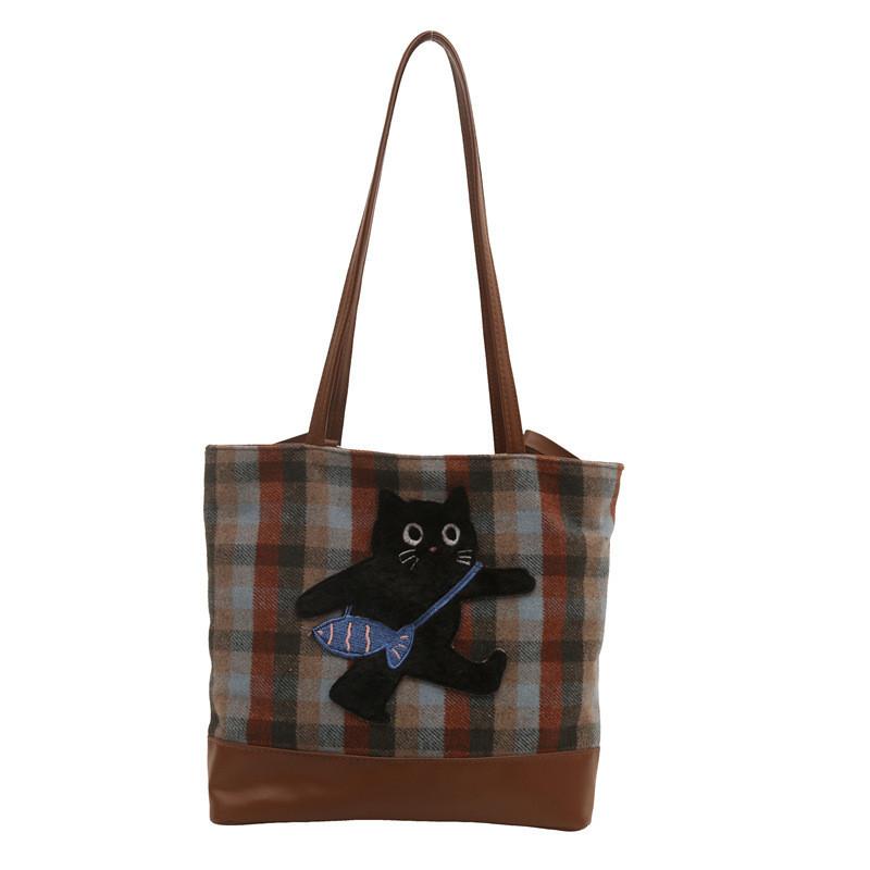 Stilvolle, geräumige Schultertasche mit Cartoon-Motiv aus der Winterkollektion in Blau und Braun