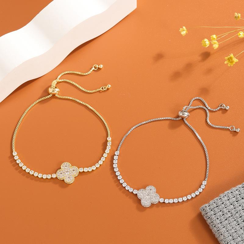 Copper inlaid master bracelet can be stretched freely Korean version popular micro-inlaid zircon four-leaf clover pendant wholesale accessories