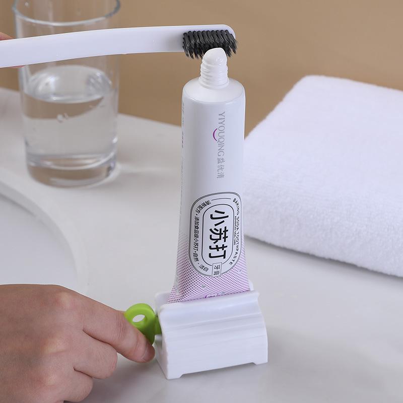1 Pc Rolling Tube Toothpaste Squeezer Toothpaste Seat Holder Stand Rotate Toothpaste Dispenser for Bathroom