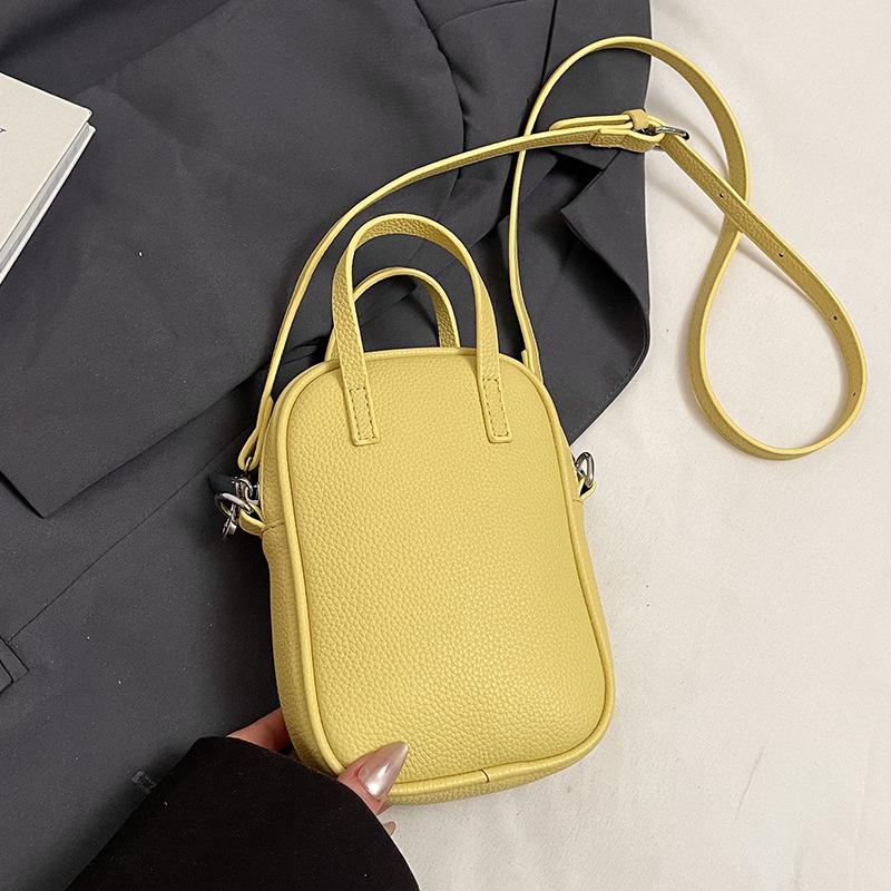 

Korean spring and summer new dopamine color fashion messenger mobile phone bag women s leisure advanced lychee pattern hand bag