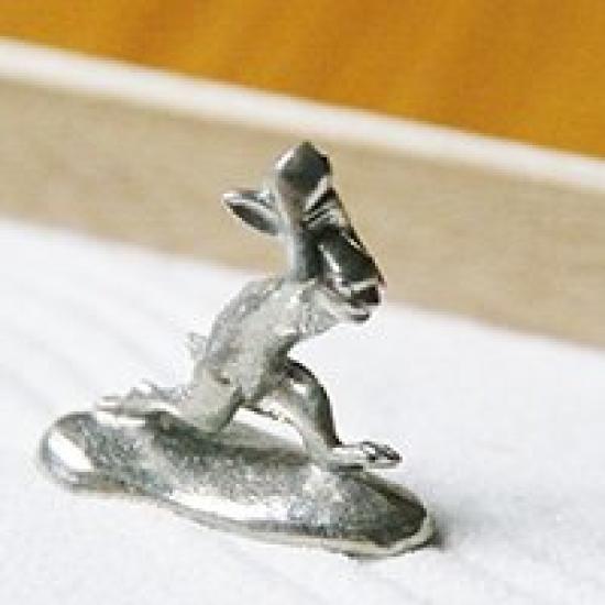 A miniature tin rabbit from the Choju Jinbutsu Giga perfect for your dry landscape painting, garden.