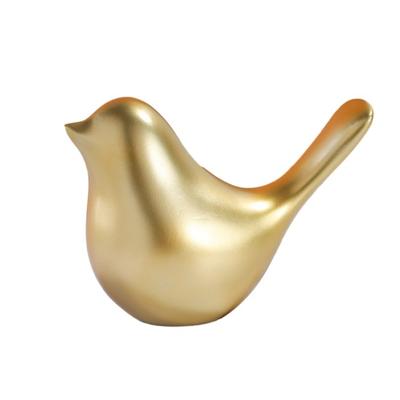 Goldene Vogelfigur im nordischen Stil, bezaubernde glatte Tiervogelstatue, Miniaturskulptur für den Schreibtisch