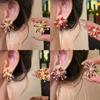 Silver needle New Year's red zircon fireworks pearl stud earrings retro temperament versatile earrings light luxury high-end earrings women