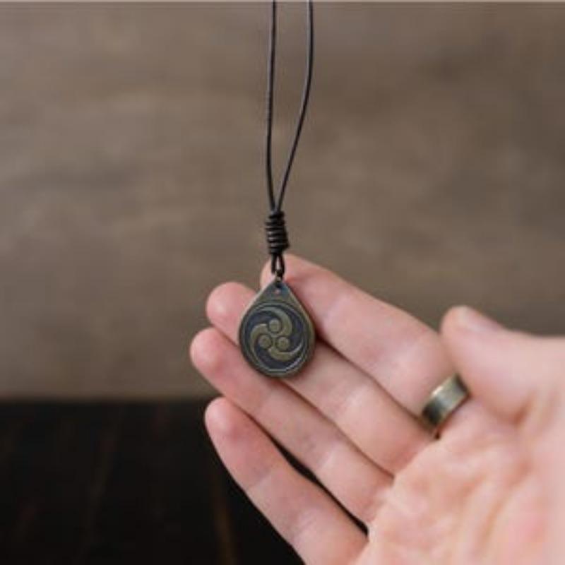 Tomoe Hams Necklace/Pendant. Made from Solid Brass with Adjustable/Sliding Leather Cord.