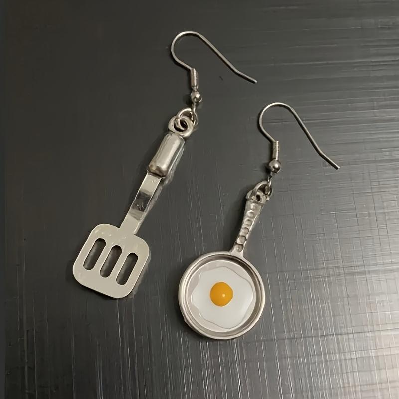 A Pair of Cute Asymmetrical Earrings Shaped Like a Frying Pan And Spatula, Perfect for Daily Wear for a with a Playful Heart