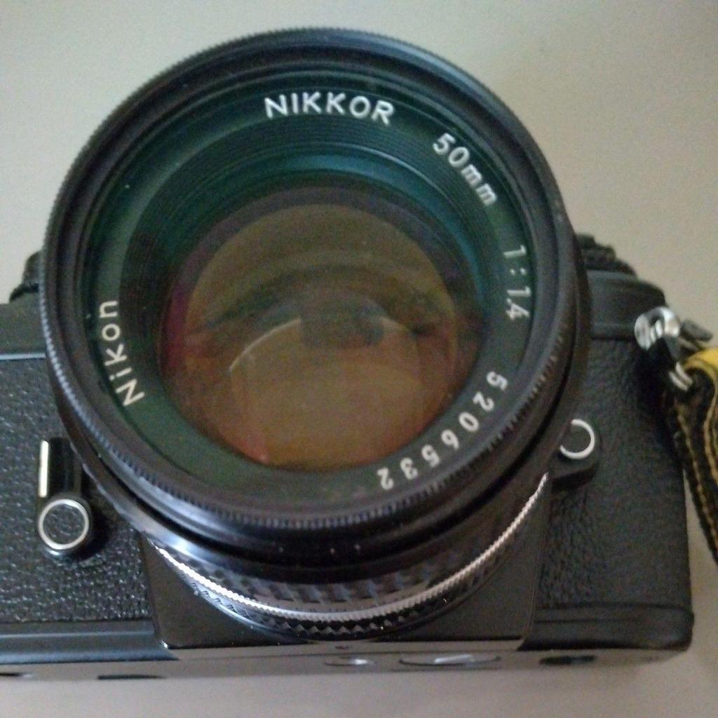 Used Nikon Film Single-lens Reflex Camera "NiKonFG" with 50mm Lens & Bonus Speedlight (strobe) "NiKon SB-15"