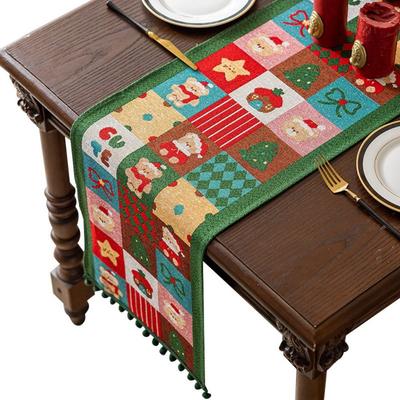 Chemin de table de Noël en polyester Motif dessin animé Motif Père Noël Drapeau de table Pompons multicolores Motif flocon de neige