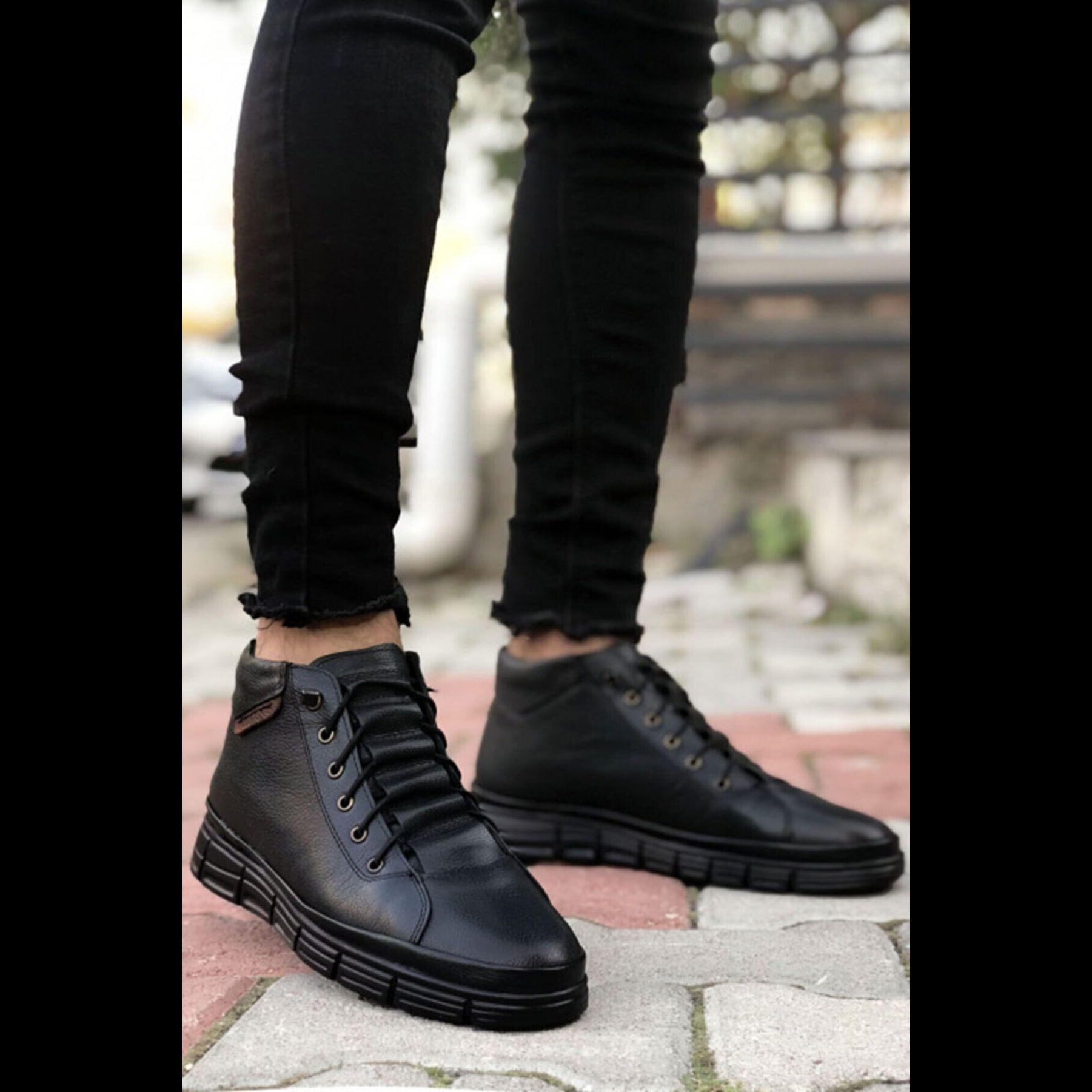 

Черные эластичные сапоги из натуральной кожи