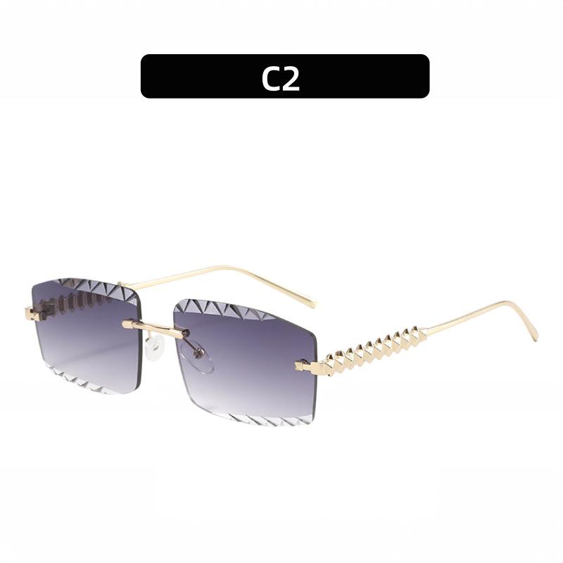 2026 Frameless Square Frame Metal Wolf Tooth Sunglasses for Men and Women