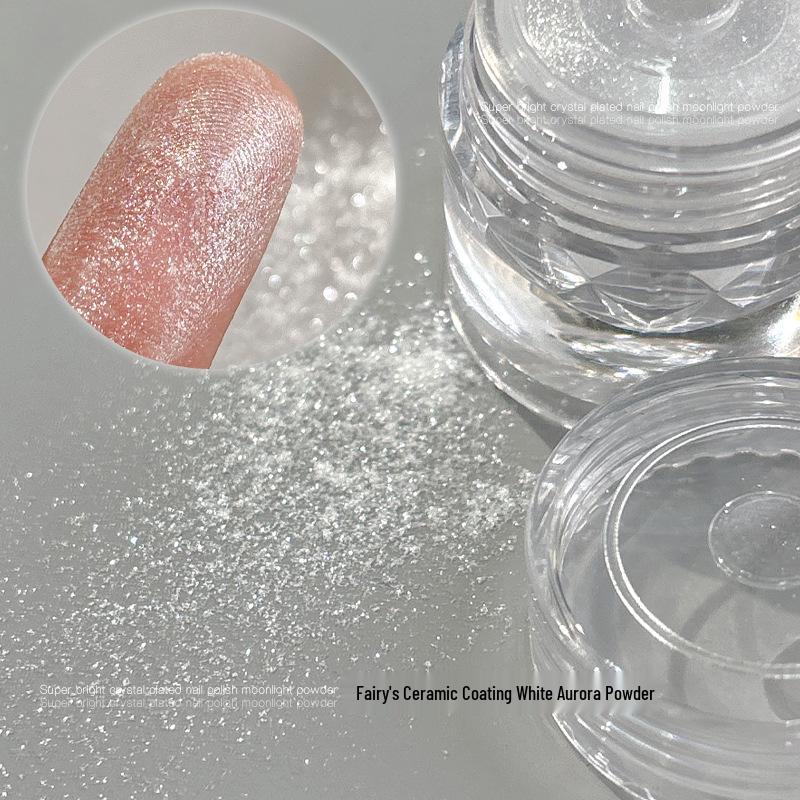 Aurora Nail Art Powder: Upgraded Crystal Coating with White Magic Mirror Effect for Easy Application and Super Bright Silver Finish.