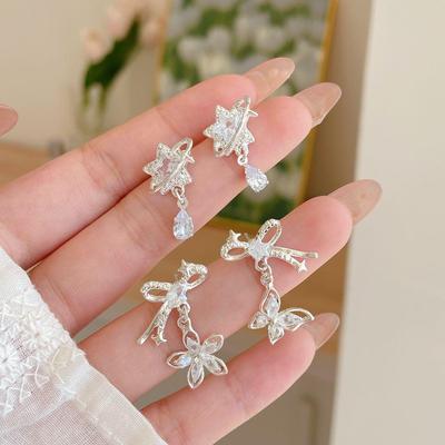 Korean Zircon Bow Star Earrings: Minimalist Luxury Design for Women In Silver