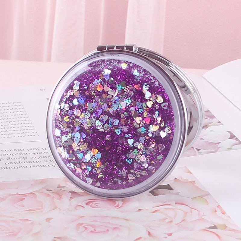 Girlish Heart Double-Sided Portable Makeup Mirror - Cute, Compact, and Foldable.