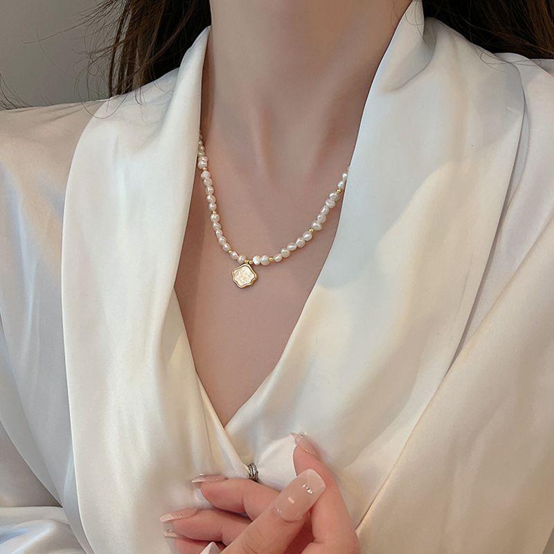 Baroque freshwater pearl necklace, elegant and stylish, a minimalist design featuring freshwater shell and cloud-shaped pearls