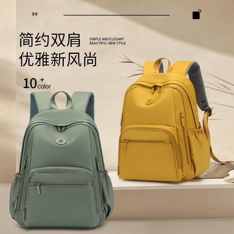 Schoolbag backpack women's 1011 new large-capacity computer bag multi-pocket college student schoolbag can be set with tie rod travel backpack