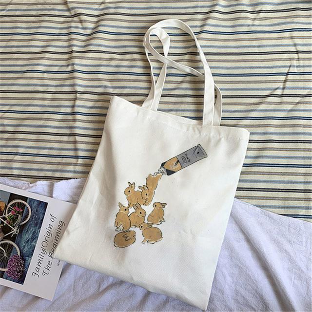 Fashion Niche Design Canvas Handbag Casual Wild Women's Shoulder Bag Student Schoolbag White Large Capacity No Zipper Handbag.