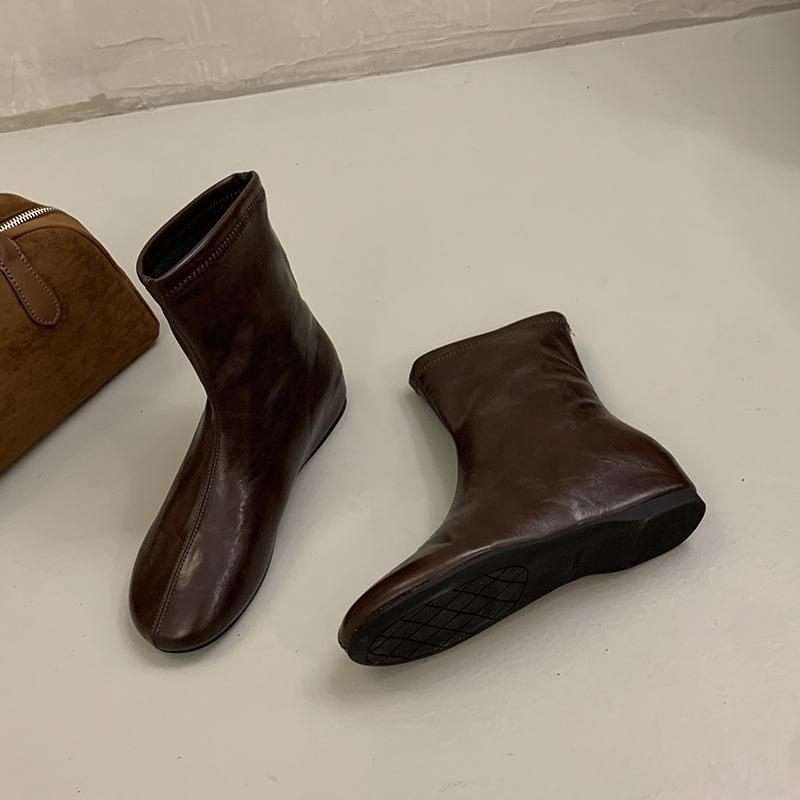 Medium leather boots flat bottom round head elastic winter new super soft thin boots inner height increase high boots look thin