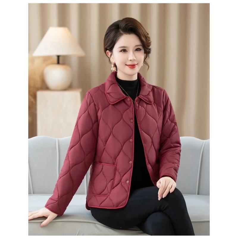 Nya Höst- och Vinter Dam Spliced Revers Knapp Ficka Mode Enfärgad Mångsidig Casual Långärmad Parkas