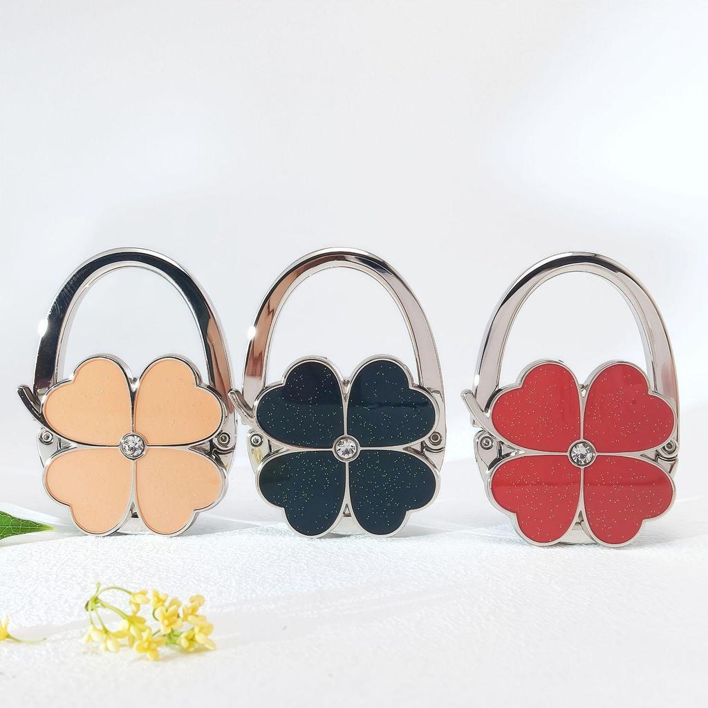 Blumenform Tragbarer Metalltaschenhalter - Faltbarer Handtaschenhaken Winzige Tragbare Haken für Geldbörse Tragetasche Organizer