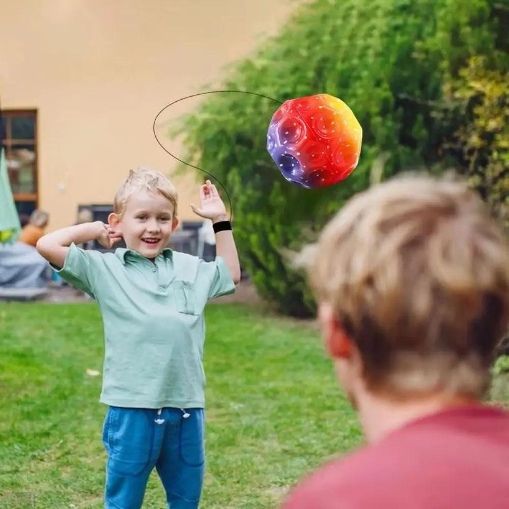 Colorful Bouncy Balls High Elasticity with Wristband Rubber Hand Ball Hole Ball Wrist Return Ball Rubber Sport Ball with Strap Bouncy Ball