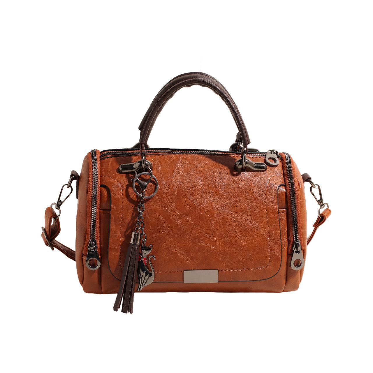 

New fashion retro handbag large capacity soft leather Boston pillow bag fringed pendant women s bag коричневий