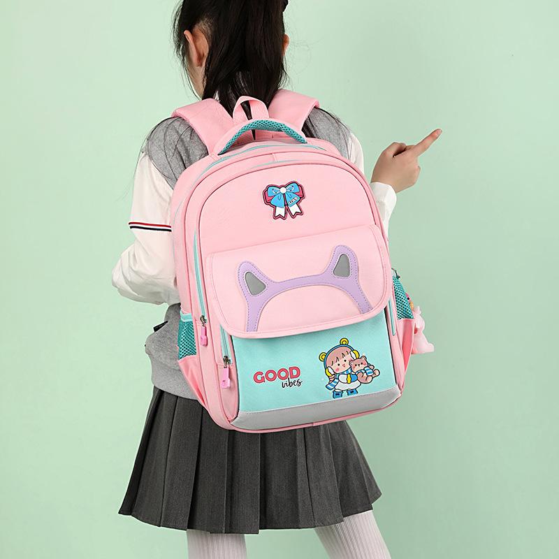 School bag for primary school students, new high-value backpack for girls, large-capacity spine protection and water-proof children's backpack