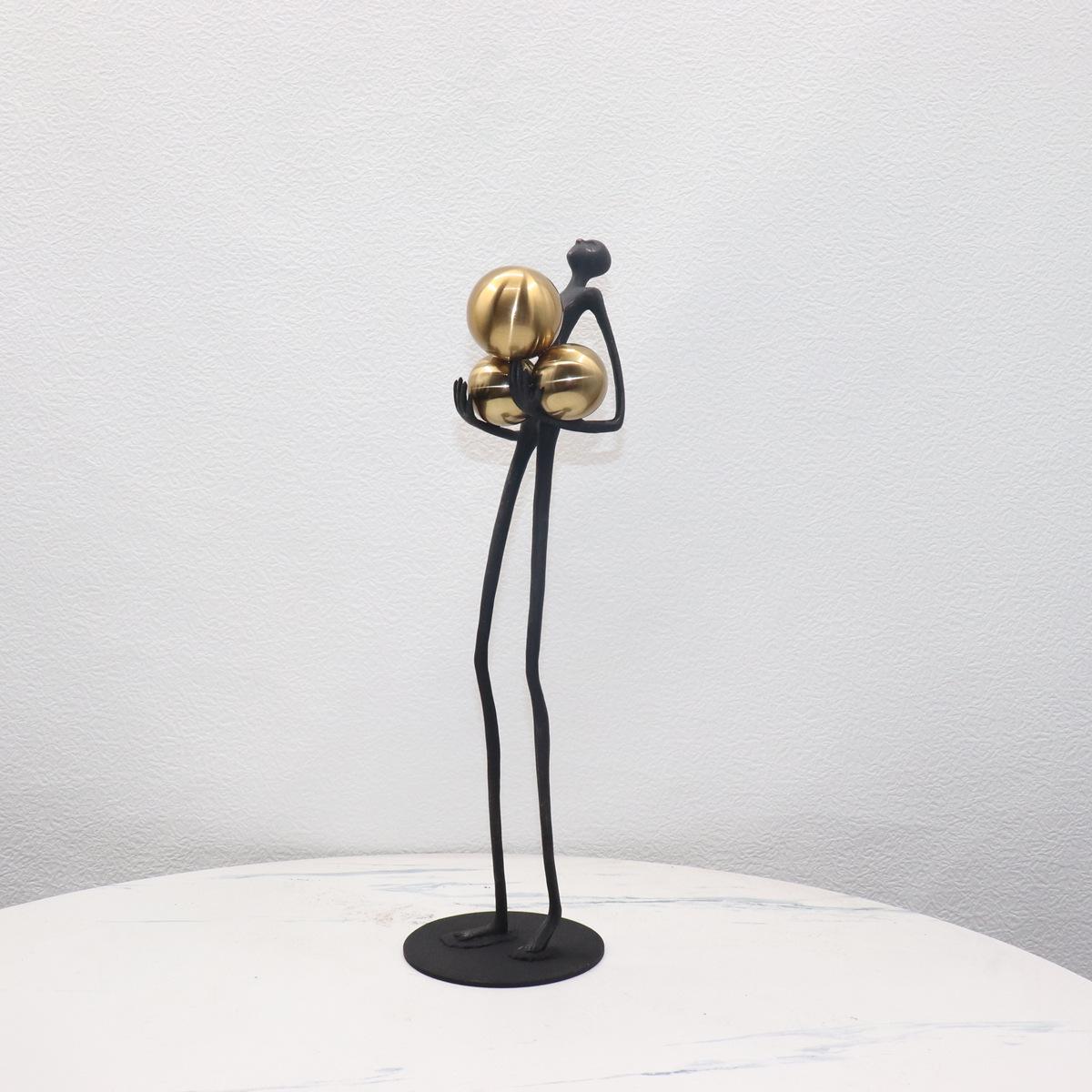 Modern Light Luxury Living Room Sculpture: Ball-Holding Figure Metal Ornament for Hotel and Exhibition Hall Decor