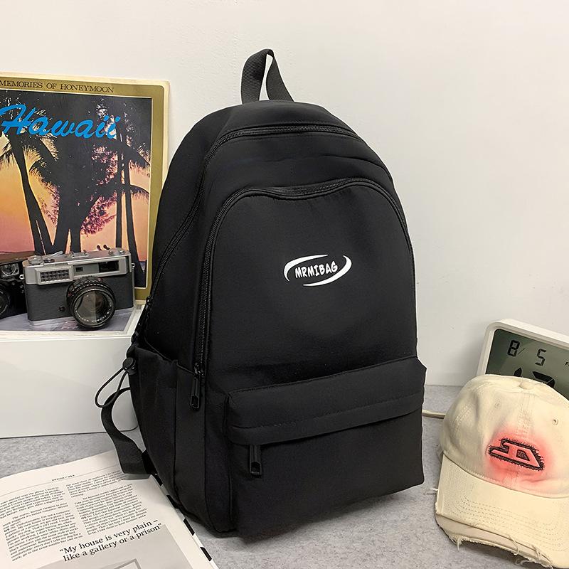 Casual and lightweight ins versatile student schoolbag large-capacity backpack Korean version commuter college student simple backpack