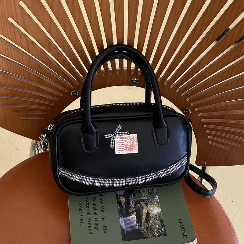 Korean ins hand-held bowling bag women's 2025 spring new fashion shoulder oblique span bag high-end small square bag