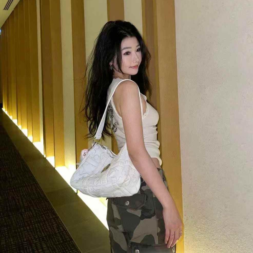 Color Splicing Hand-held Underarm Chicken Nugget Bag First Layer Cowhide Single Shoulder Men and Women of the Same Style Locomotive Hot Girl Bag