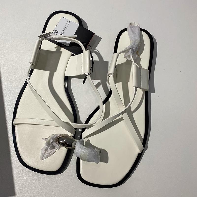 Flat-soled sandals women's fashion versatile one-word strap metal sleeve toe beach vacation sandals