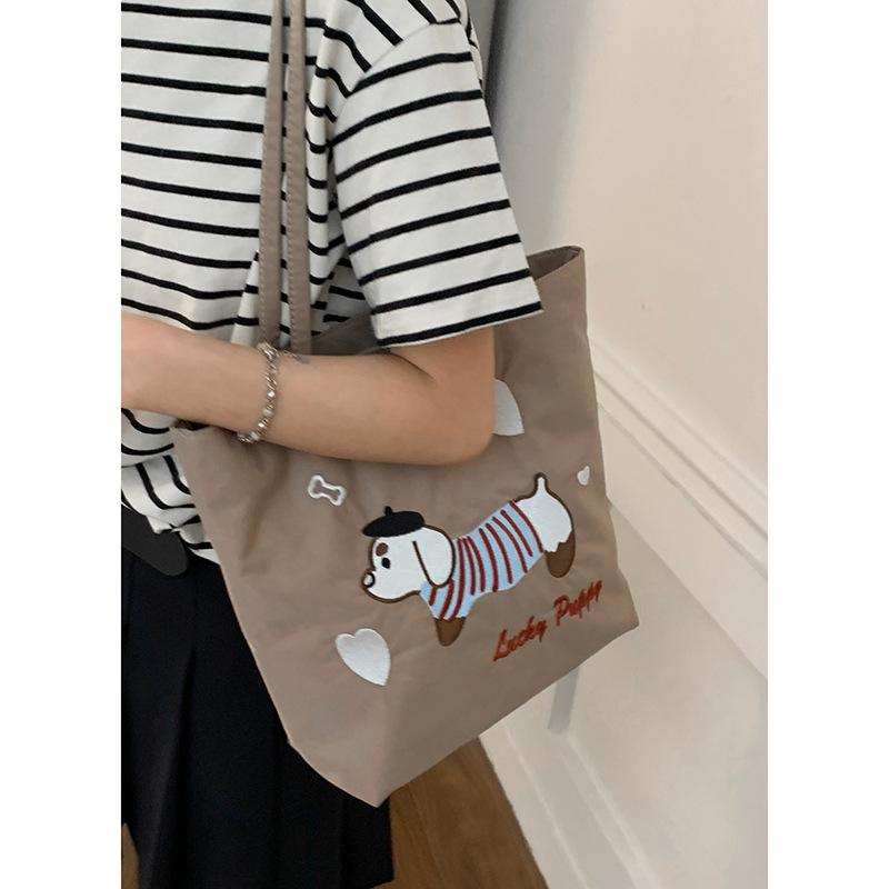 Canvas Bag Design Sense Niche Underarm Bag Women 2025 New Simple Cartoon Puppy Tote Bag Shoulder Bag Portable