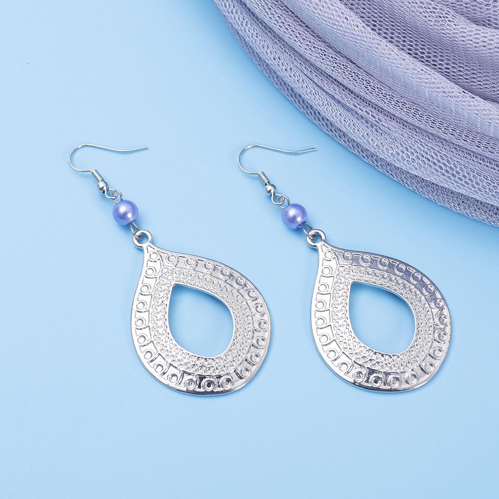 Zinc Alloy Retro Hollow Water Drop Earrings with Exquisite Pattern for Women