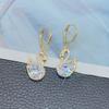 1 Pair of Luxurious Golden-Tone Swan Dangle Earrings with Sparkling Rhinestones - Elegant Zinc Alloy Fashion Jewelry for Women