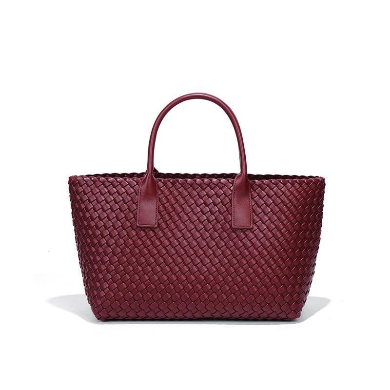 New women's handbag high-end sense large-capacity versatile child and mother bag commuting versatile simple hand-woven bag