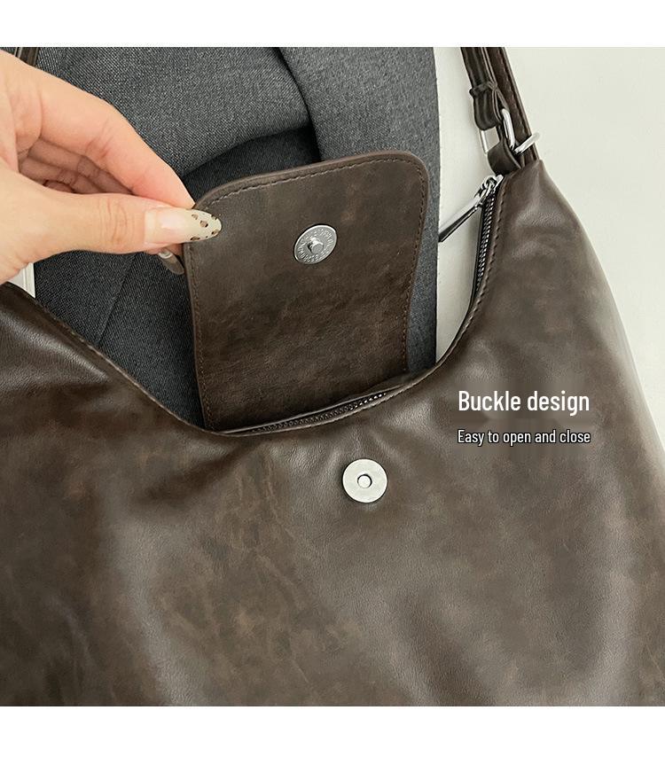 Nische Retro 2025 Damen Schulter-Crossbody-Tasche mit großem Fassungsvermögen und Anhänger