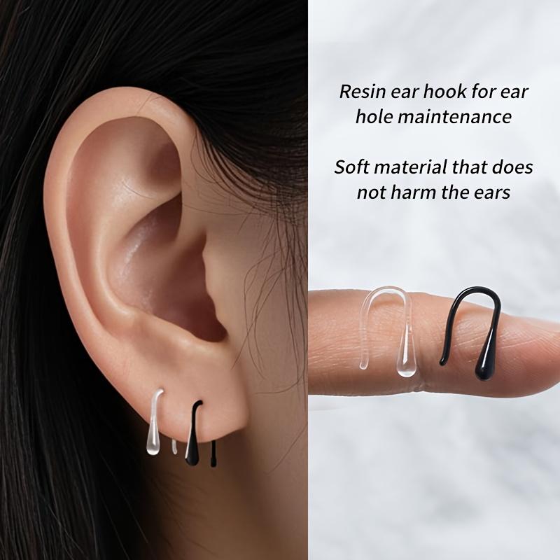1 Box Contains About 12pcs of Hypoallergenic Ear Studs, Made of Soft Plastic Material. They Feature Drop-shaped and Transparent Hook Earrings