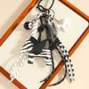 Department of cute leather little pegasus pendant pony black eight braided rope keychain high-end bag hanging very complicated DIY