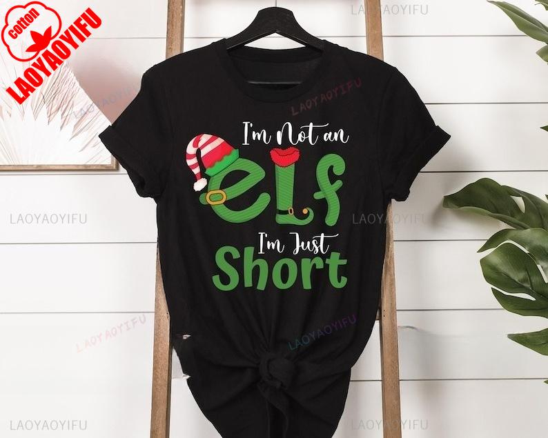 

Im Not An Elf Im Just Short Merry Xmas Funny T Shirt Festive 2025 Christmas Elf High Quality Cotton Simple Graphic T Shirts 4XL