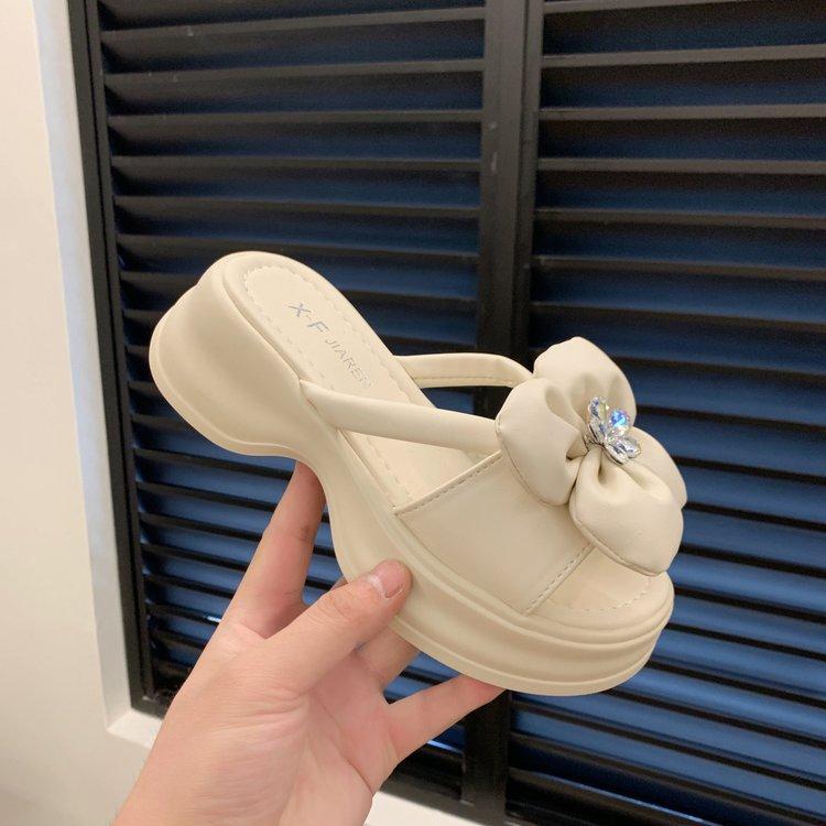 Thick-soled cool slippers women's fashion outer wear 2024 summer foreign trade new casual flower one-word muffin sole beach shoes
