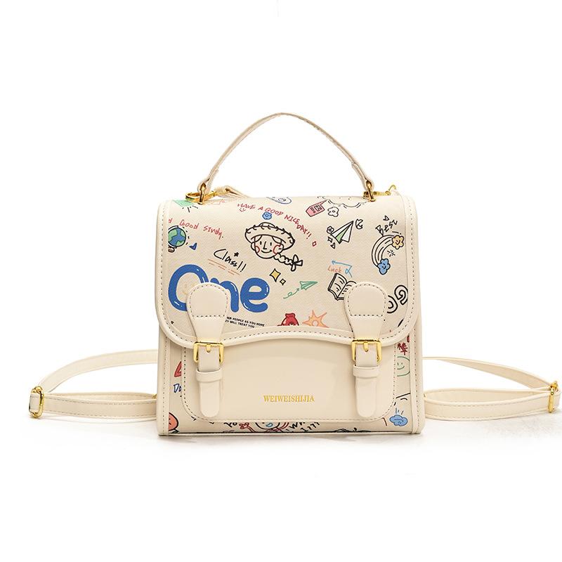 Korean version of college style cute cartoon printed handbag women 2025 new fashion casual backpack student schoolbag