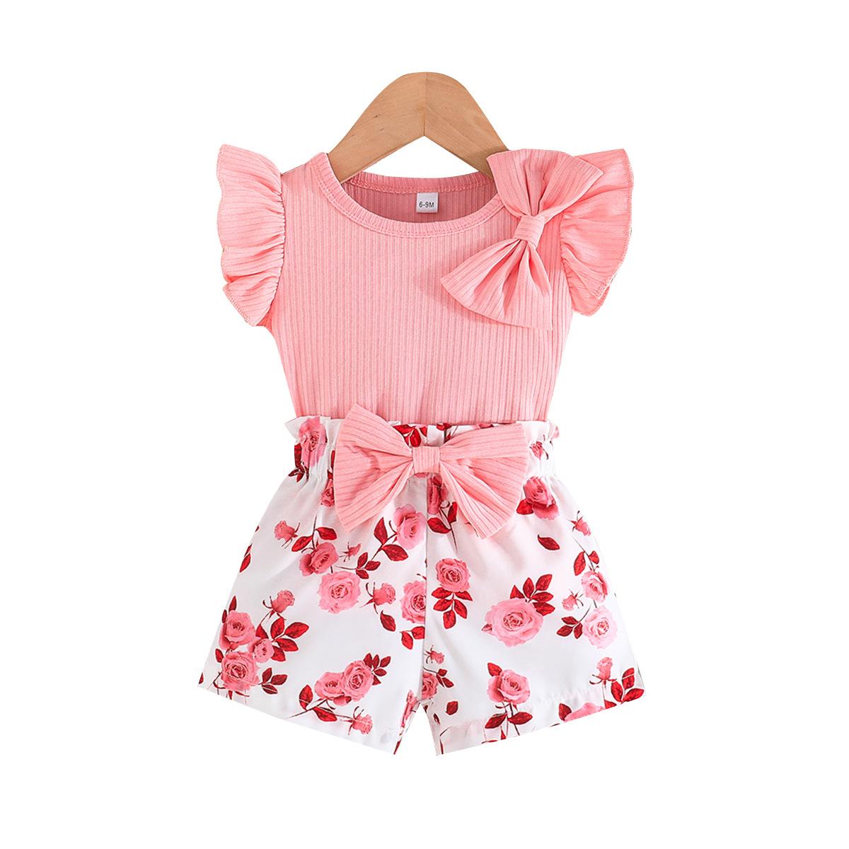 

Милый топ с бантом на плече для девочек + шорты с цветочным принтом, комплект 2025 года, повседневный детский летний комплект 18-24M