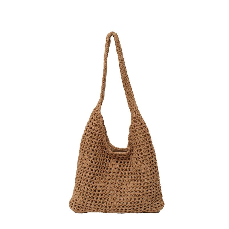 Niche hollow bucket bag women's summer new fashion woven beach bag leisure vacation shoulder bag