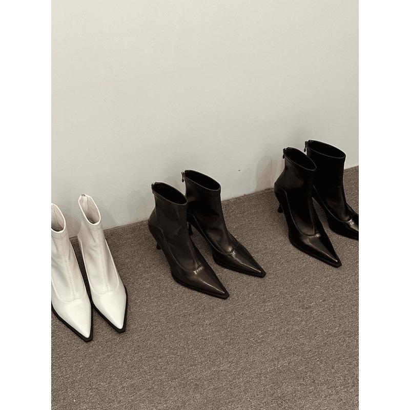 Pointed thin heel soft leather thin boots rear zipper high heel European and American popular short boots
