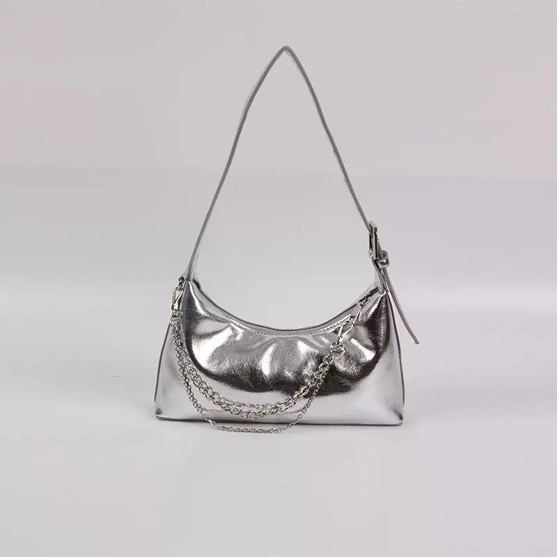 

Модная ручная сумка подмышку, нишевый дизайн, сумка-багет, универсальная текстура, одноплечевая сумка кроссбоди серебряный
