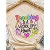 Teaching Is A Work Of Heart Women's Tee - Colorful Teacher Graphic, Casual Purple Top