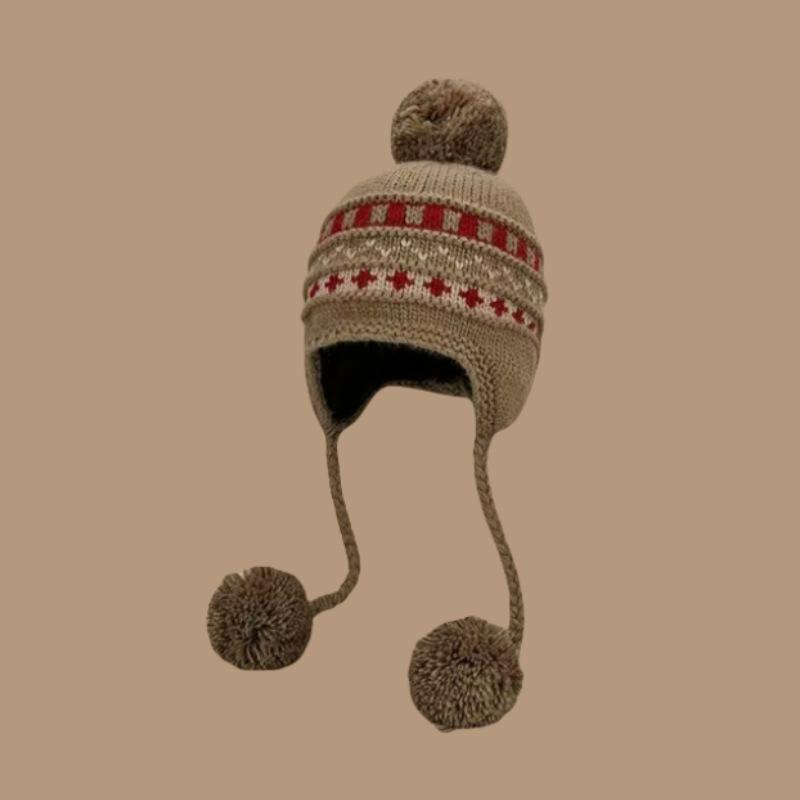 Autumn and winter lace-up ear protectors knitted hat women's Fair Island wind bag head hairball hat thickened warm jacquard wool hat