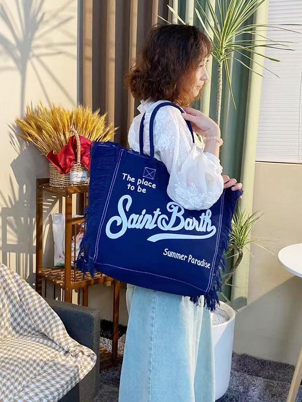 Large Capacity Canvas Tote Bag with Denim Fabric and Tassel Design for Commuting