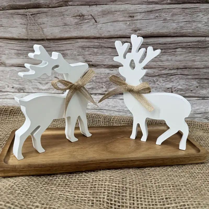 Weihnachtsrentierdekorationen, weiße Rentier-Holzbastelarbeiten, Kleiderschrankfensterbänke, festliche Atmosphäre Ornamente